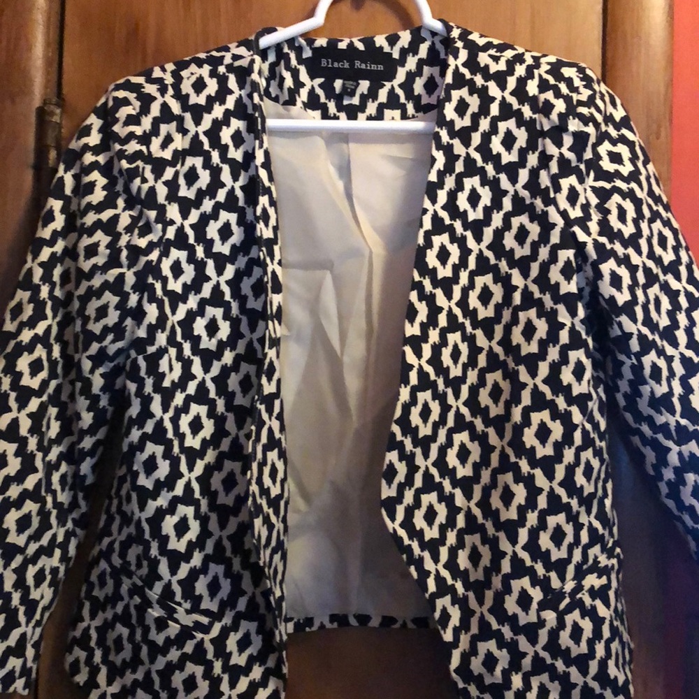 I love this jacket!!Sm. Black and white jacket w/shoulder pads!